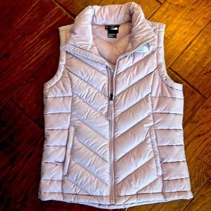 North Face puffer vest.  Worn once. Excellent condition.